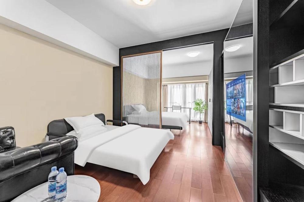 Shengmei Ya International Apartment - Tap to explore photos