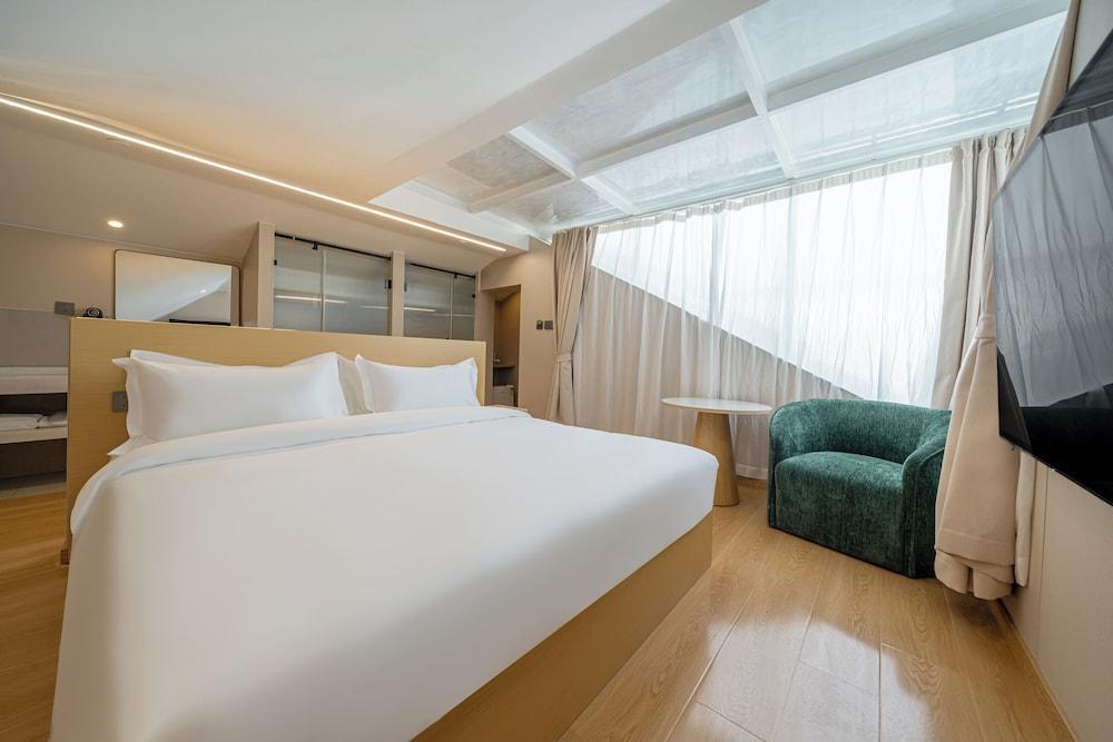 MEI DI DU JIA HOTEL Room Type - Family Suite, Courtyard View MEI DI DU JIA HOTEL Room Type - Family Suite, Courtyard View