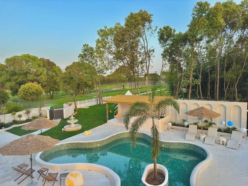 QIMeow Garden Hotel - Tap to explore photos