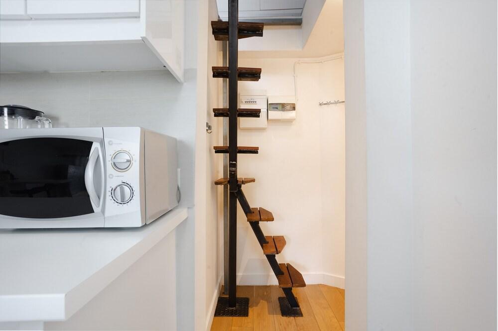 Exclusive! Duplex apartment steps to the Louvre & metros