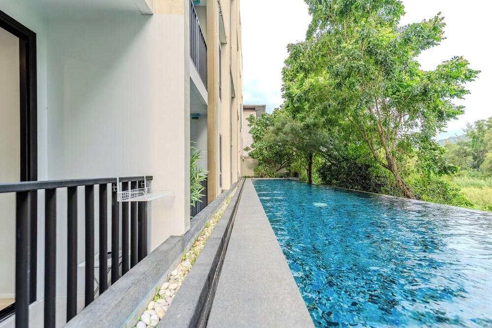 ZCapeX2 1BR 2nd Floor, Pool View & Fast Wifi by SilqStay - Tap to explore photos