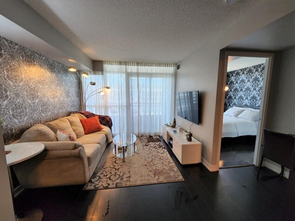 Downtown 2Bd Condo with steps to CN Tower and Lake - Tap to explore photos