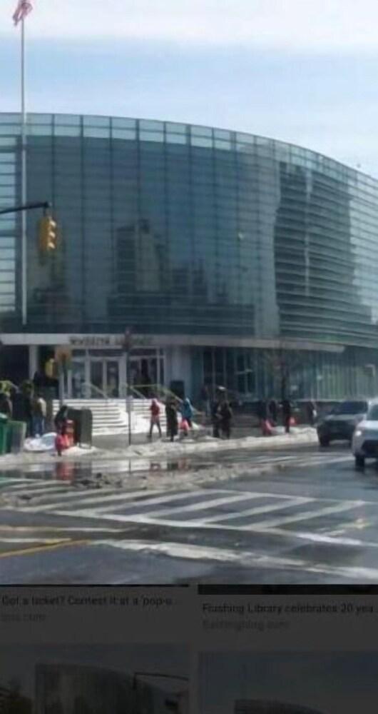 By Main st FlushingLibrary, near Citified & US Open events