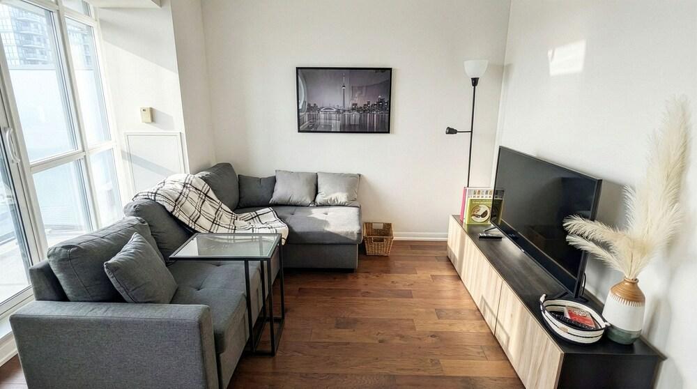 Stylish Fort York Condo with Pool + Gym - Tap to explore photos