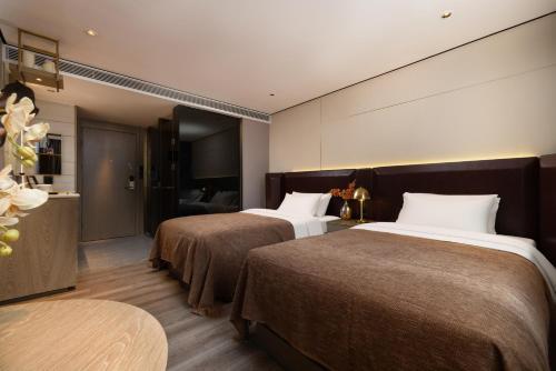 Echarm Plus Hotel - Tap to explore photos