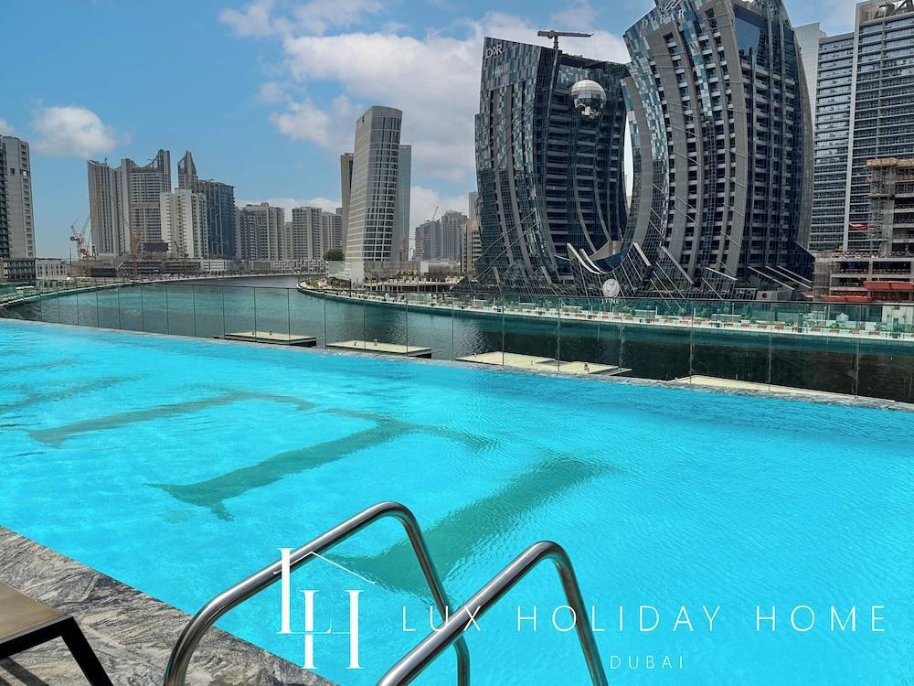 LUX The Modern Binghatti Canal Suite 3 - Tap to explore photos