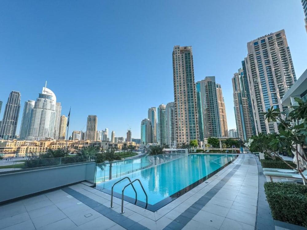 Maison Privee Sky-High Elegance w/ Unrivaled Burj Khalifa Views - Tap to explore photos