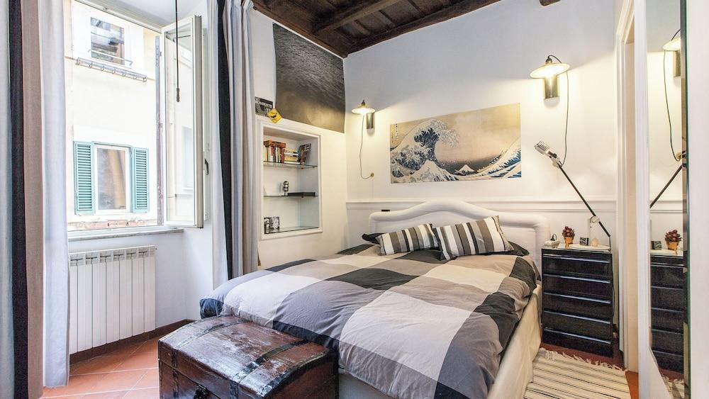 Rental in Rome Lungaretta Apartment - Tap to explore photos
