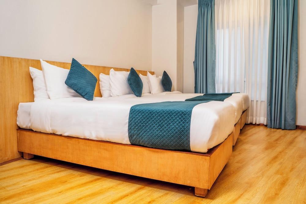 Marlo Hotels Room Type - Deluxe Triple Room