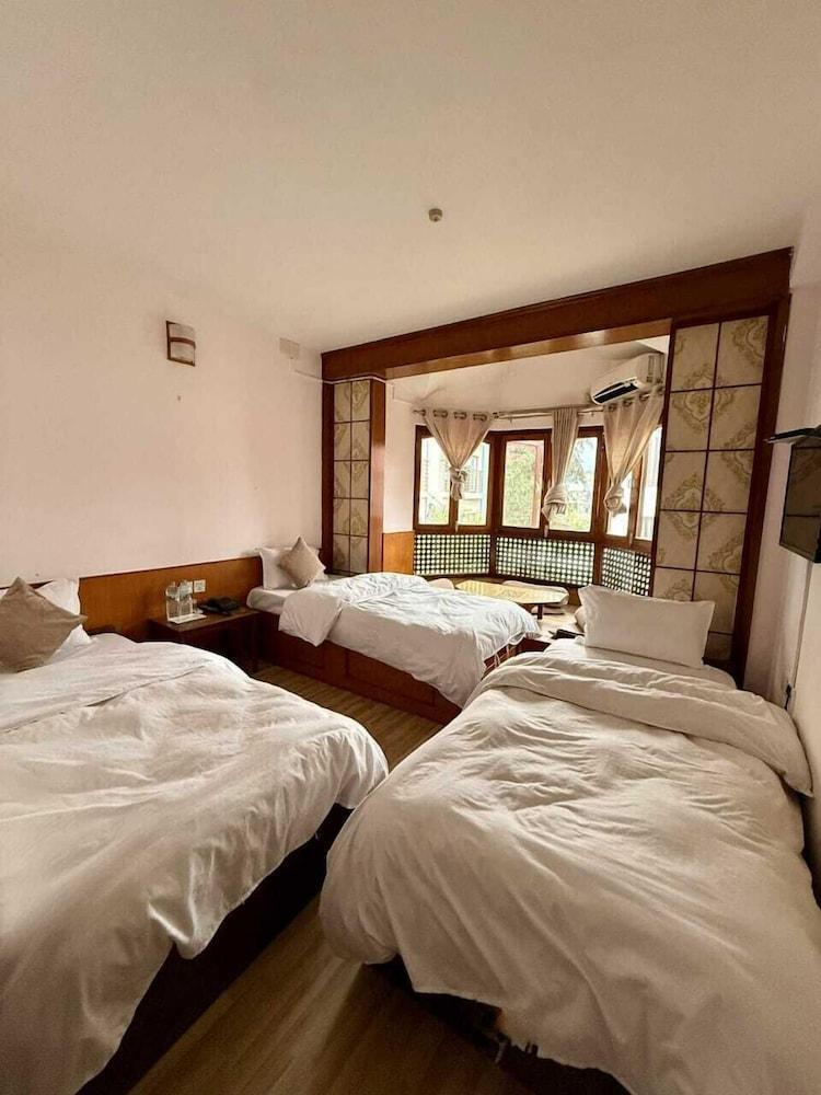 Laavanya Inn Room Type - Deluxe Triple Room