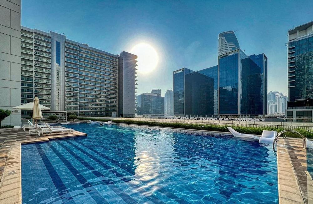 Waterfront 2BR w Canal View Near Burj Khalifa - Tap to explore photos