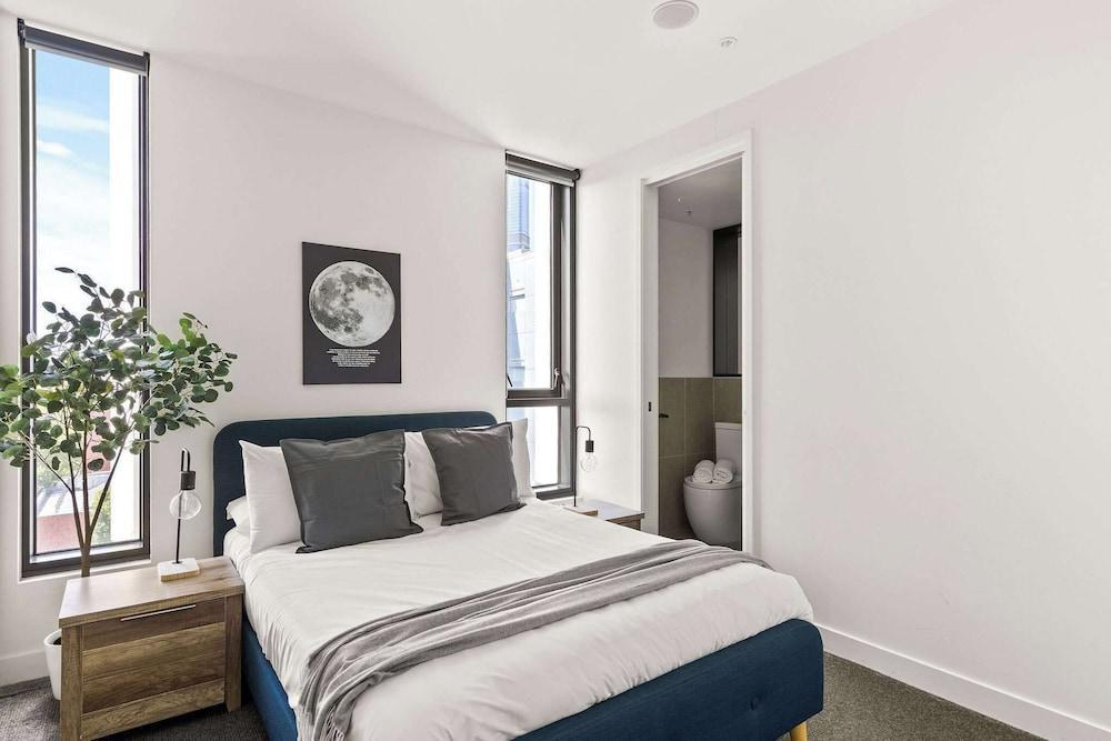 Modern 2BR Apt w Parking Near Melbourne Central - Tap to explore photos