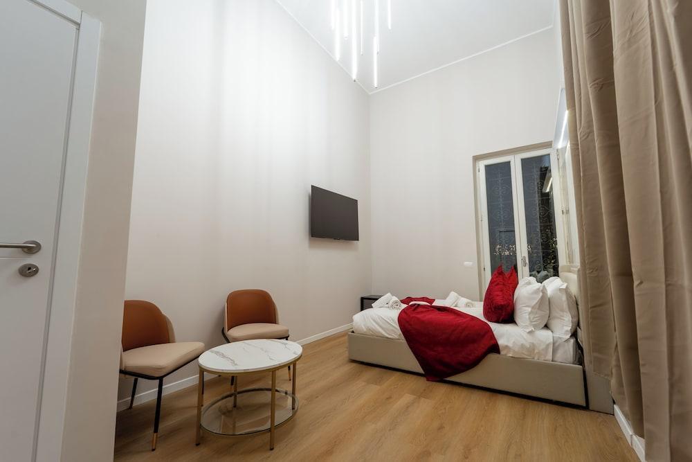 Giulia Urban Retreat Suites - Tap to explore photos