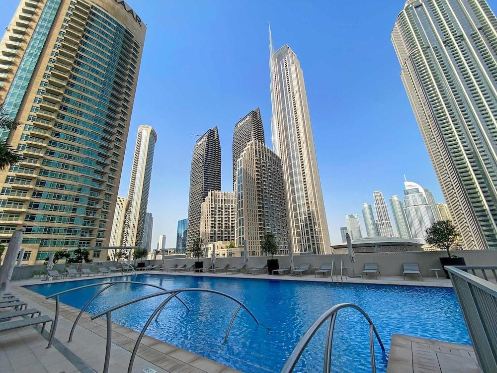 Downtown Apartment w Tower Pool Balcony - Tap to explore photos