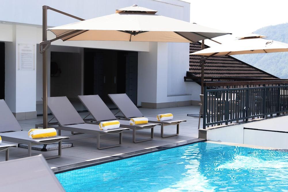 Atithi Suites - Tap to explore photos