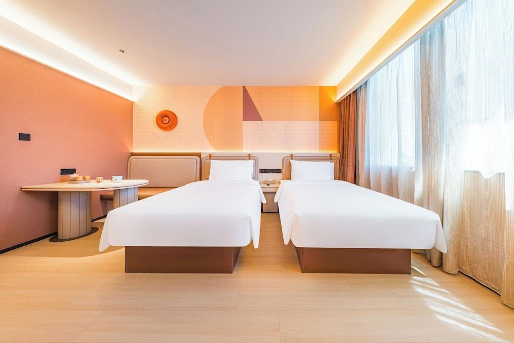 Orange Hotel - Tap to explore photos