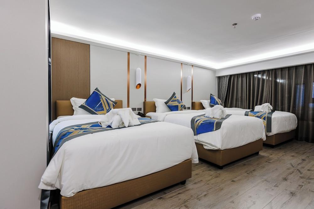 MARQUIS HOTEL Room Type - Economy Triple Room, City View