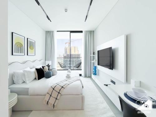 Cozy & Chic upgraded Studio with Balcony Dubai JVC - Tap to explore photos