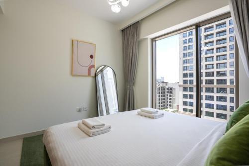 Elegant at Creek Beach Lotus 1BHK - Tap to explore photos