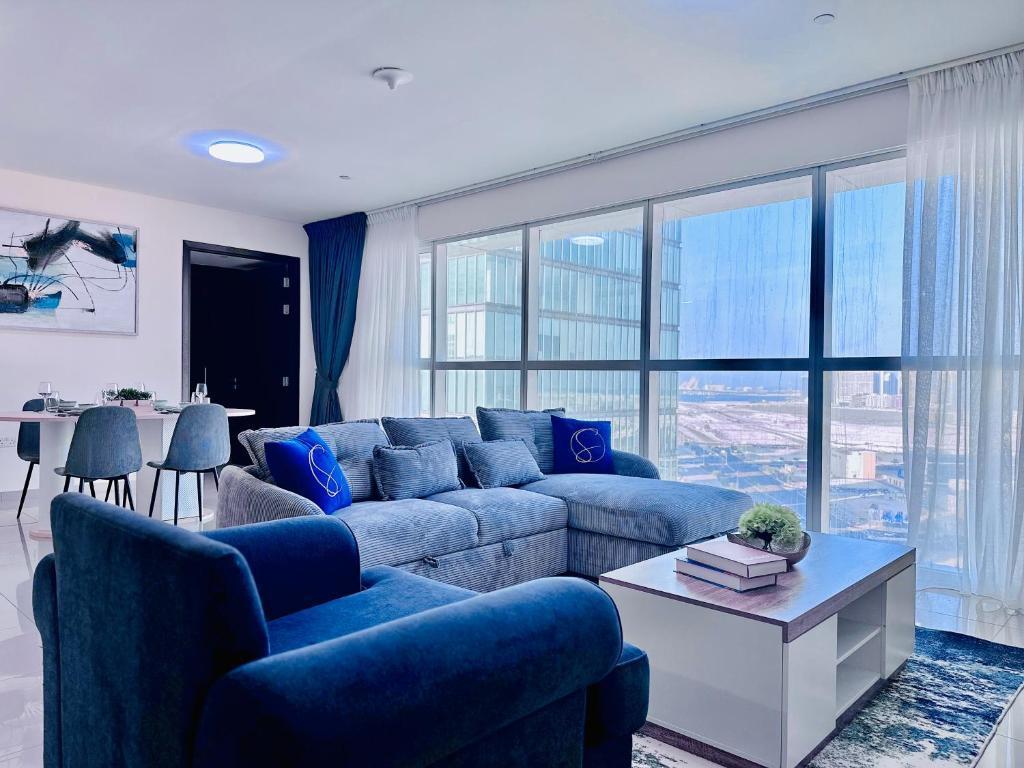 Modern 1BR with Sofa Bed RAK Tower - Tap to explore photos