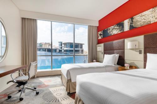 Crowne Plaza Doha - The Business Park by IHG - Tap to explore photos