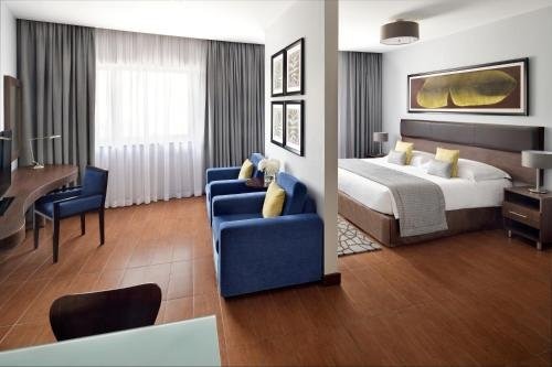 Movenpick Hotel Apartments Al Mamzar Dubai - Tap to explore photos