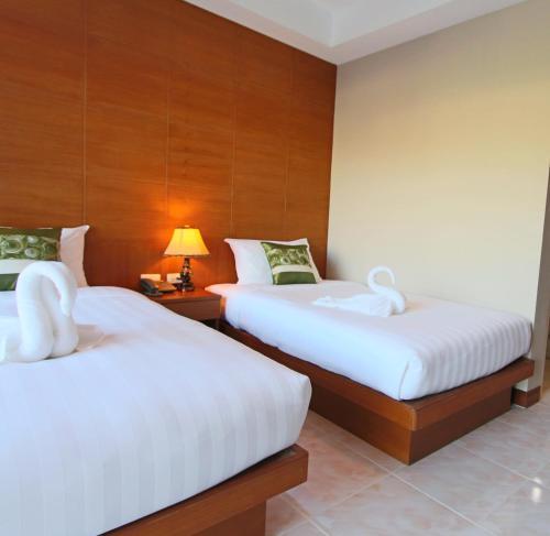 Good Nice Hotel Patong - Tap to explore photos