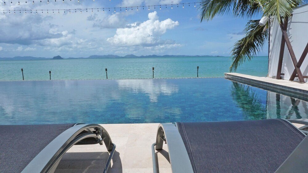 The Nchantra Pool Suite Phuket - Tap to explore photos