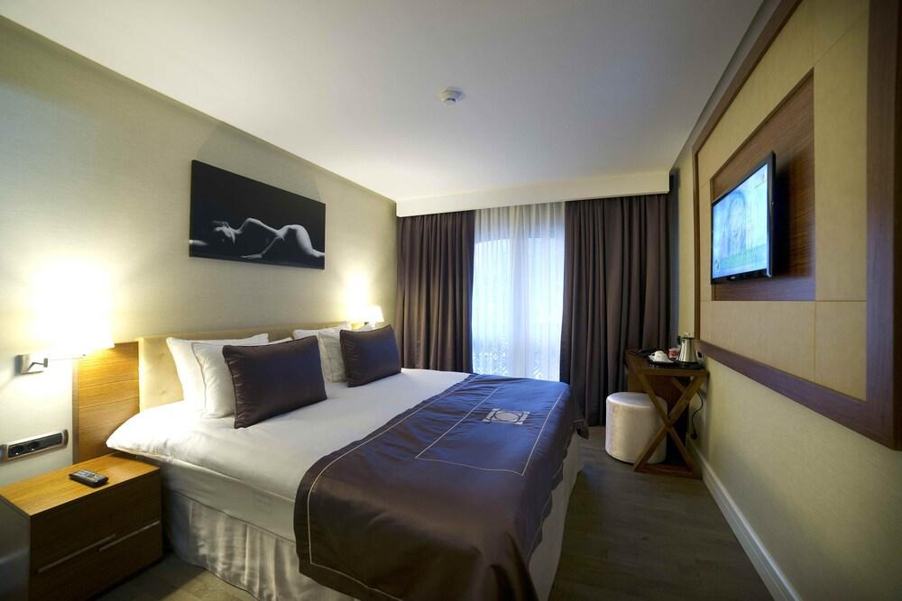 Taba Luxury Suites - Tap to explore photos