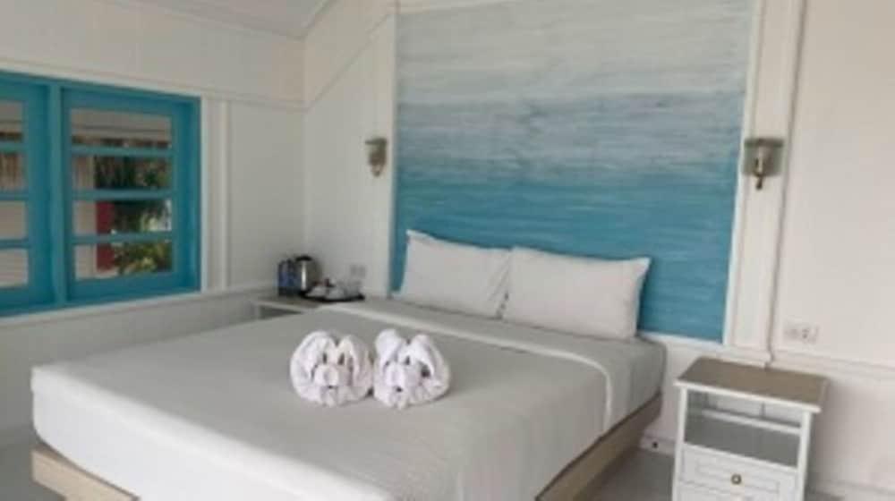 Sand Sea Beach Resort - Tap to explore photos