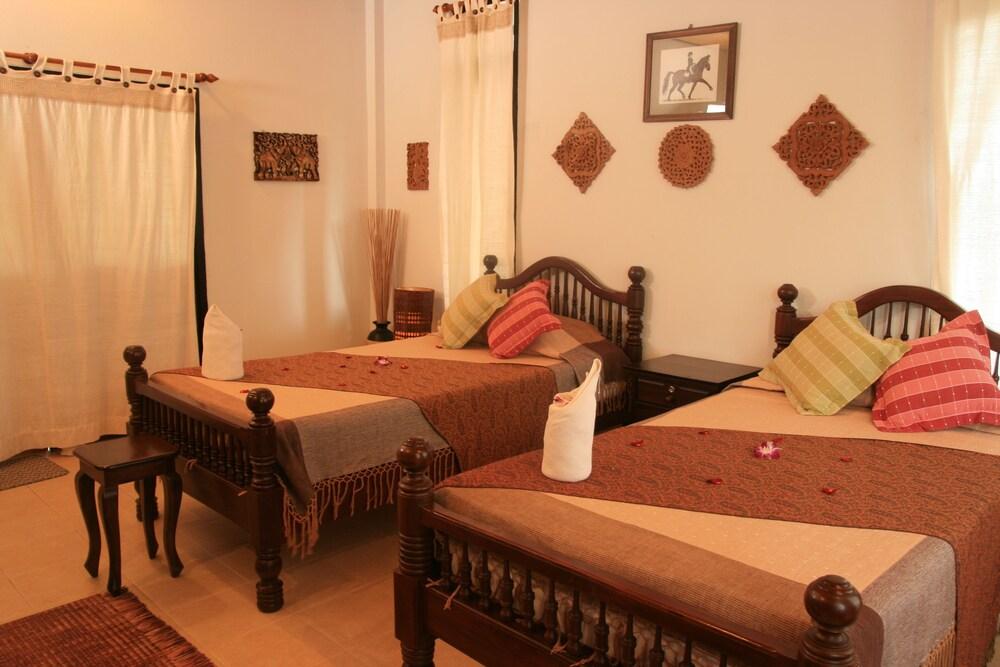 Varinda Garden Resort - Tap to explore photos