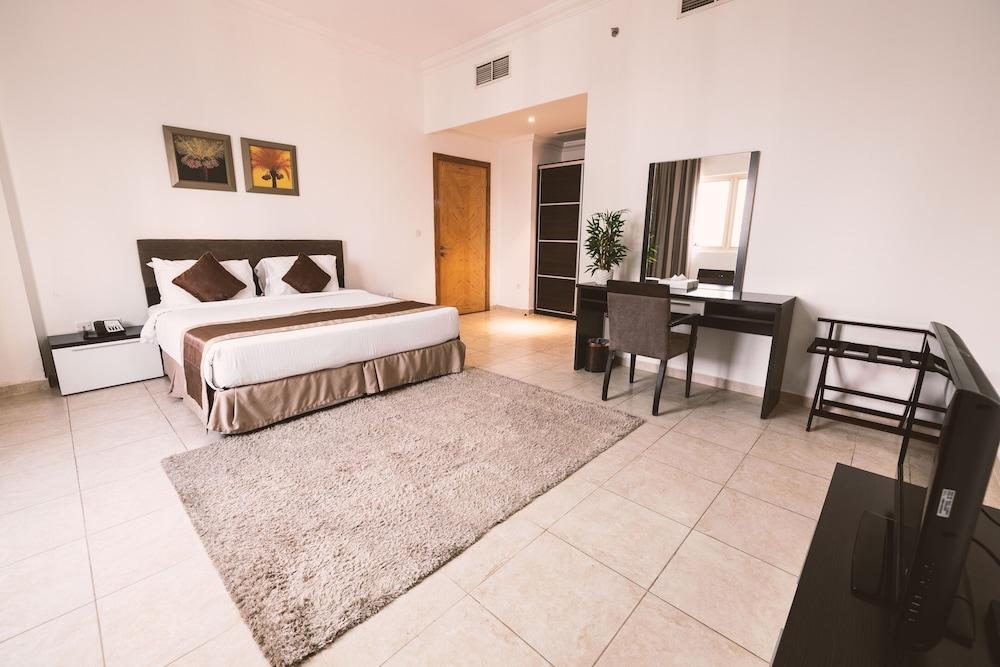 Magnum Hotel & Suites West Bay Room Type - Suite, 2 Bedrooms Magnum Hotel & Suites West Bay Room Type - Suite, 2 Bedrooms