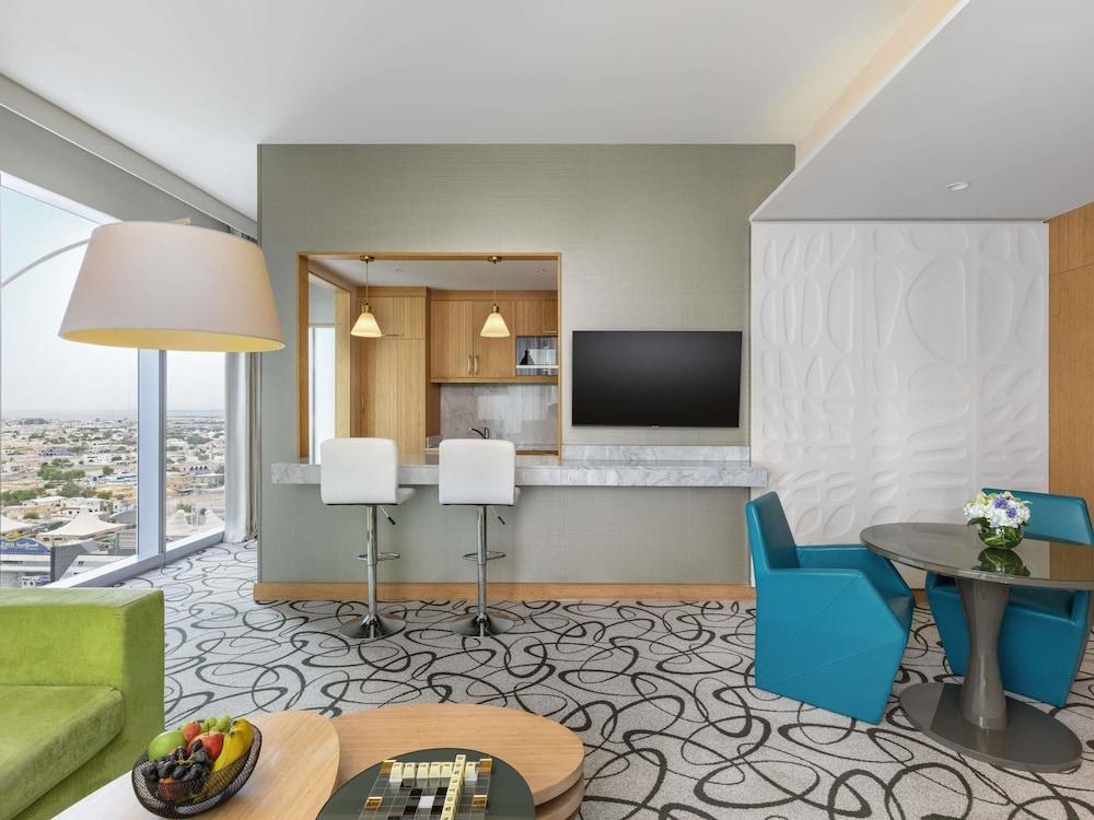 SOFITEL DUBAI DOWNTOWN Room Type - TWO BEDROOM DOWNTOWN SUITE, 1 Double bed and 2 Single beds, Airport Transfer included