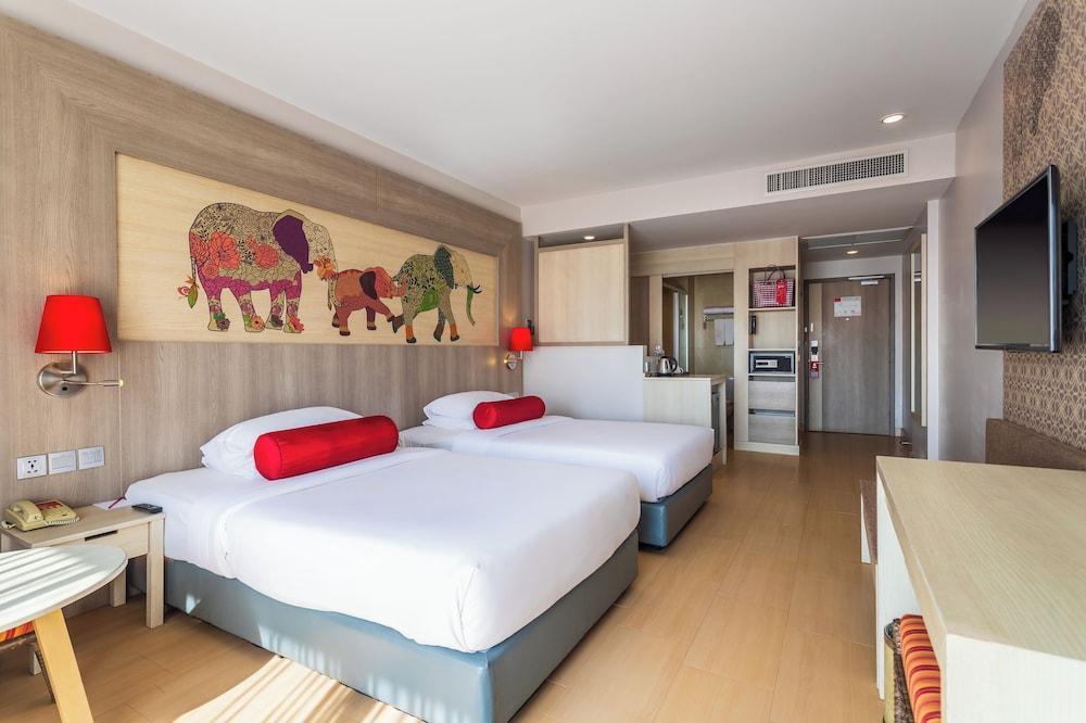 Ramada by Wyndham Phuket Deevana Patong - Tap to explore photos