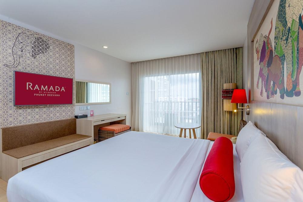 Ramada by Wyndham Phuket Deevana Patong - Tap to explore photos