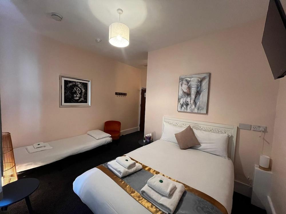 United Lodge Hotel & Apartments Room Type - Triple Room