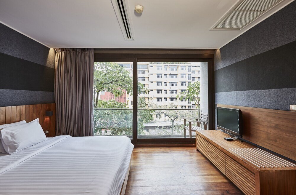 LUXX Langsuan Hotel - Tap to explore photos