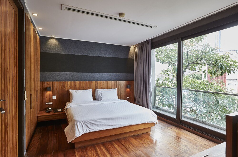LUXX Langsuan Hotel - Tap to explore photos