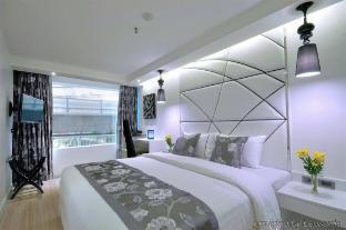 Sukhumvit Suites Hotel - Tap to explore photos
