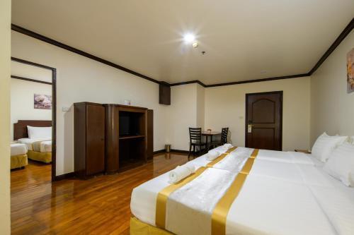 The Victory Executive Residences Hotel - Tap to explore photos