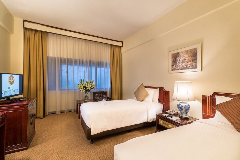 Hotel Grand Pacific Room Type - Deluxe Triple Room - Either 3 Single Beds OR 1 Double and 1 Single Bed Hotel Grand Pacific Room Type - Deluxe Triple Room - Either 3 Single Beds OR 1 Double and 1 Single Bed