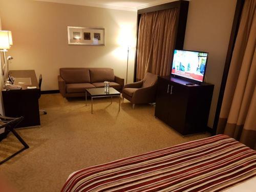 Ramada Plaza Deira - Tap to explore photos