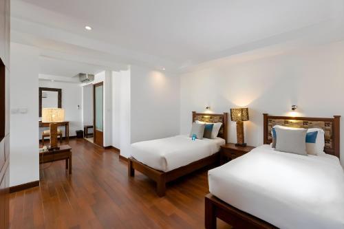 Baan Laimai Beach Resort and Spa - Tap to explore photos