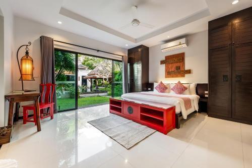 The Bell Pool Villa Resort - Tap to explore photos