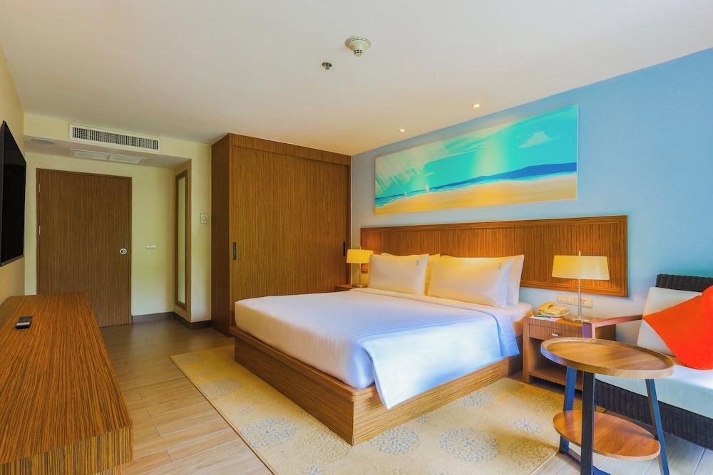 Holiday Inn Resort Phuket Surin Beach, an IHG Hotel - Tap to explore photos