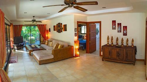 Coconut Paradise Villas - Tap to explore photos