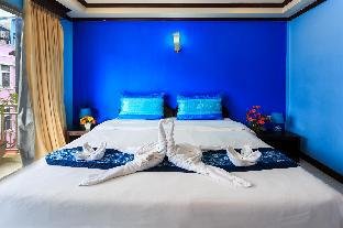 Hotel Grand Orchid Inn - Tap to explore photos