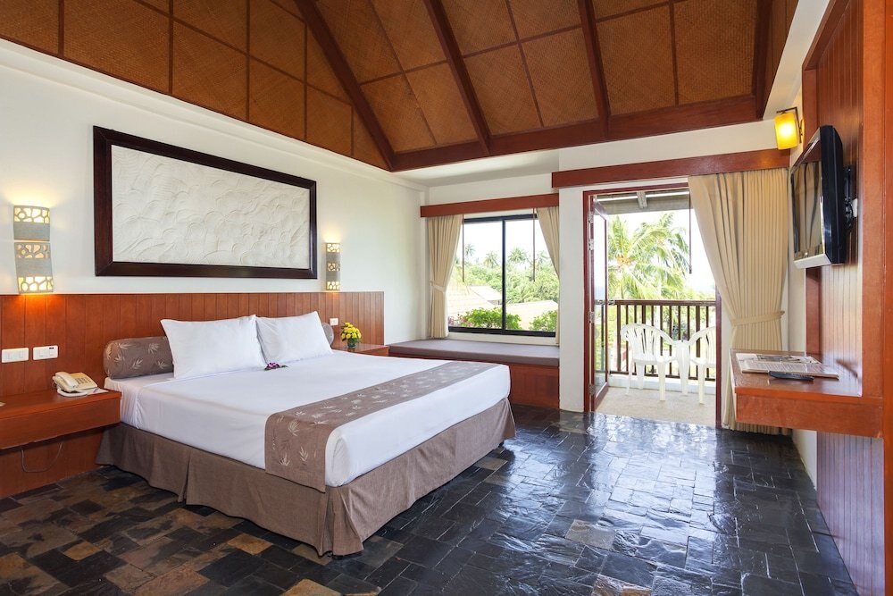 Karona Resort & Spa - Tap to explore photos