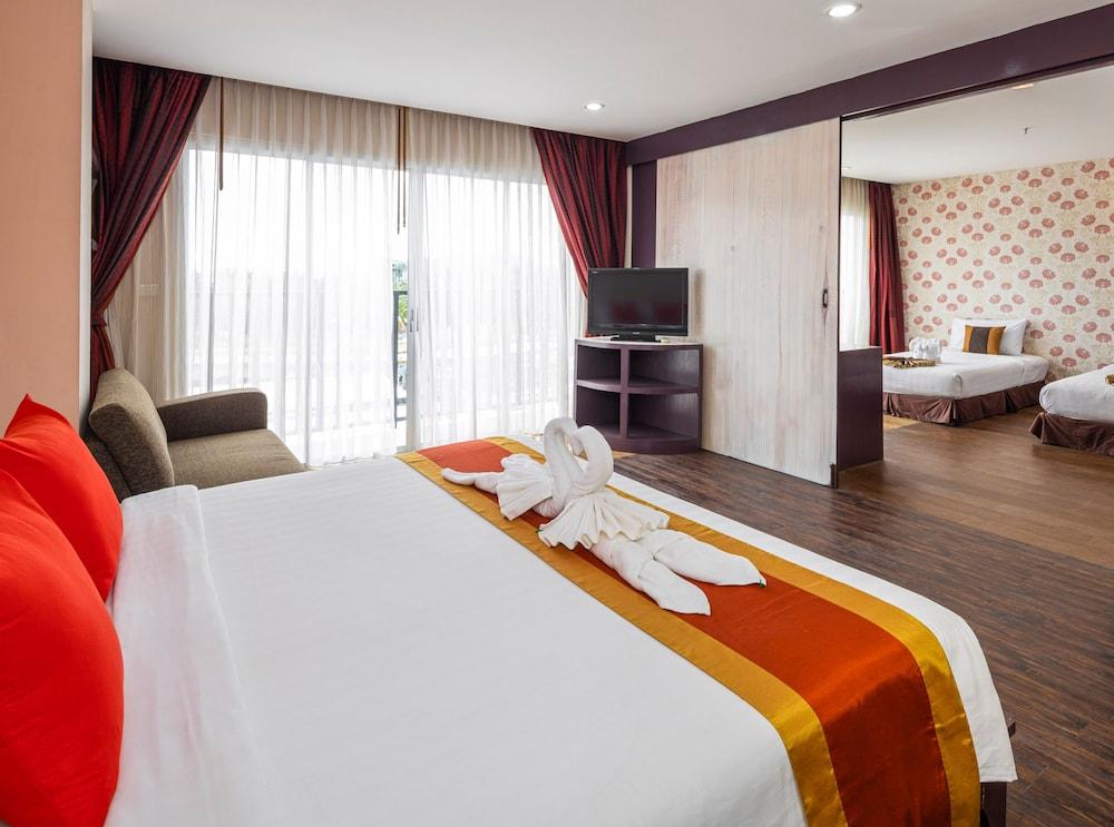 Malin Patong Hotel - Tap to explore photos