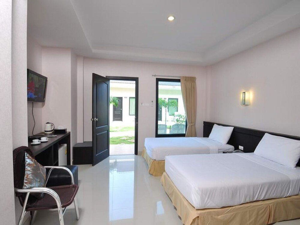 The Natural Resort Phuket - Tap to explore photos